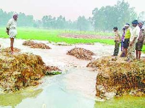 Cut canal path, submerged farmland hundred acres